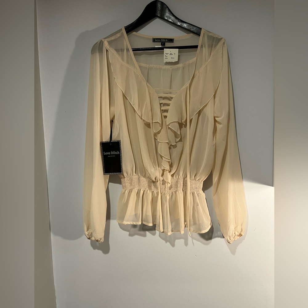 New Love Stitch sheer V- neck long sleeve blouse size large in a cream colour